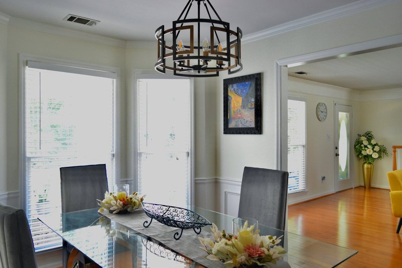 The dining room looking through toward the front of the house.