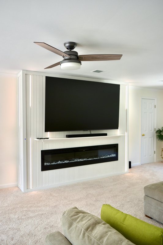 The upstairs lounge television wall seen from the sofa.